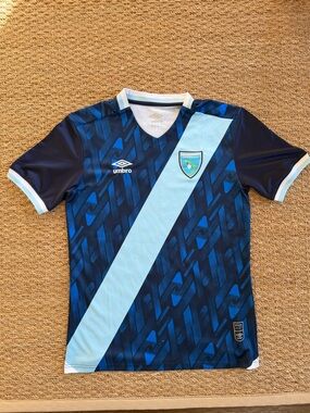 SOCCER JERSEY Umbro Navy and Light Blue Diagonal Stripe
